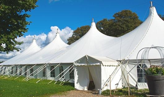 a line of sleek and modern portable toilets ready for use at an upscale corporate event in Mattydale